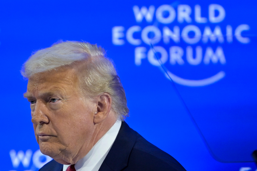 President Donald Trump enters the stage for his special address during the 56th annual meeting of the World Economic Forum, WEF, in Davos, Switzerland, Wednesday, Jan. 21, 2026. (Gian Ehrenzeller/Keystone via AP)