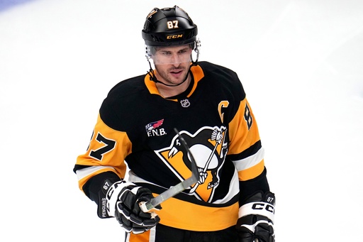 Pittsburgh Penguins' Sidney Crosby skates back to the bench during the third period of an NHL hockey game against the Vancouver Canucks in Pittsburgh, Tuesday, Oct. 21, 2025. (AP Photo/Gene J. Puskar) Pittsburgh Penguins' Sidney Crosby skates back to the bench during the third period of an NHL hockey game against the Vancouver Canucks in Pittsburgh, Tuesday, Oct. 21, 2025. (AP Photo/Gene J. Puskar)