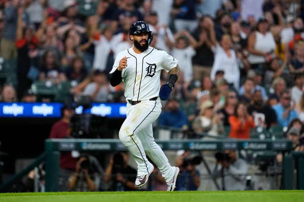 Detroit Tigers' Gleyber Torres rounds third base on his way to score against the Tampa Bay Rays during the fifth inning of a baseball game Tuesday, Aug. 25, 2026, in Detroit. (AP Photo/Paul Sancya)