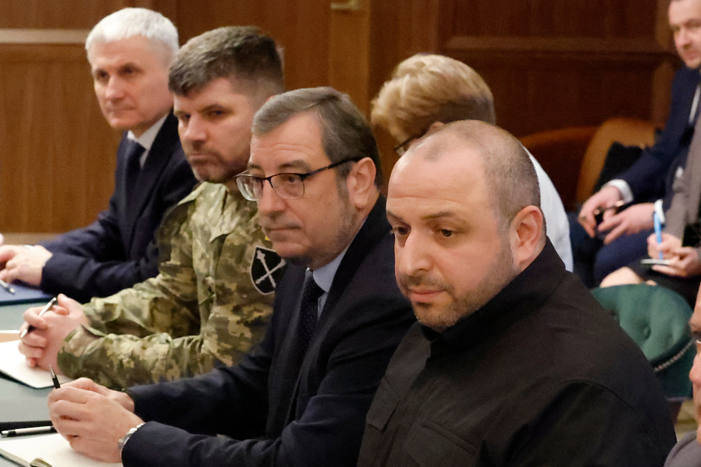 Ukrainian officials, left to right, Oleg Ivashchenko, Head of the Foreign Intelligence Service, Andrii Hnatov, Chief of the General Staff, Vadym Skibitskyi, Deputy Chief to the Head of the Defence Intelligence and Rustem Umerov, Secretary of the National Security, look on during a meeting, Sunday, Nov. 30, 2025, in Hallandale Beach, Fla. (AP Photo/Terry Renna)