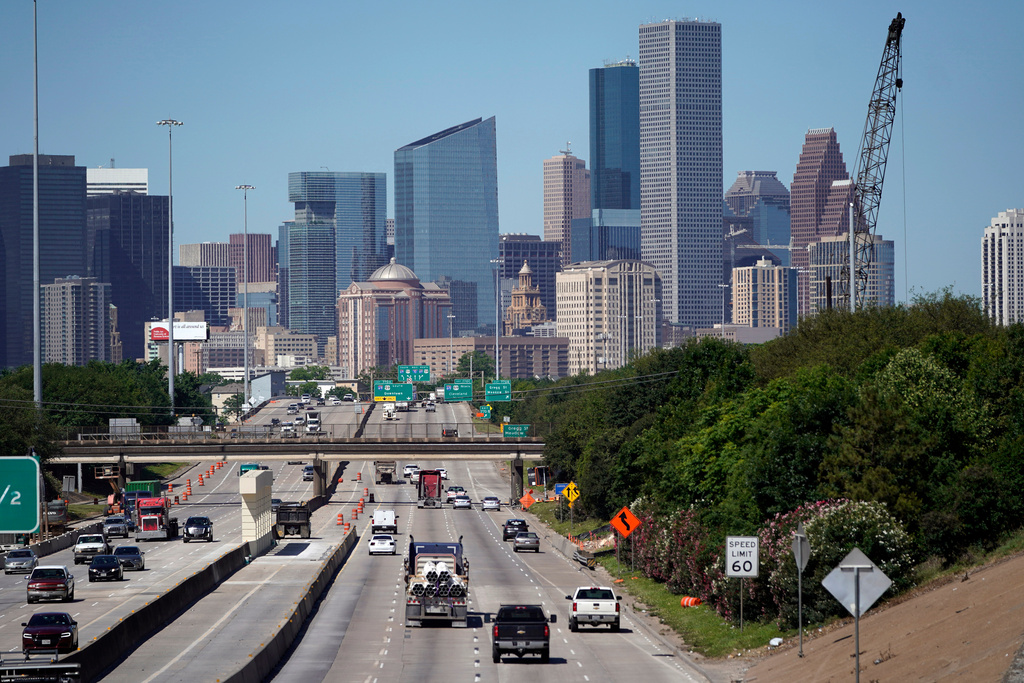 FILE - Traffic moves along Interstate 10 near downtown Houston, April 30, 2020. (AP Photo/David J. Phillip, File)
