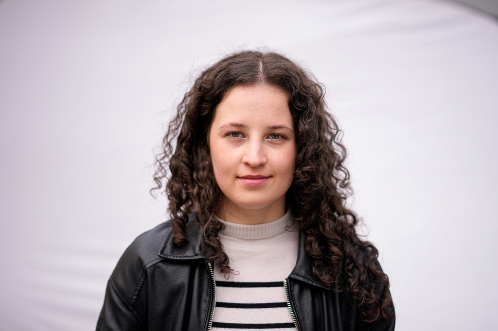 Mira Nagy, 19, poses for a portrait in Budapest, Hungary, Monday, April 13, 2026. "I listened a lot of podcasts, I did my research and I figured out that staying in power for sixteen years was not okay. That defeats the point of democracy." (AP Photo/Petr David Josek)