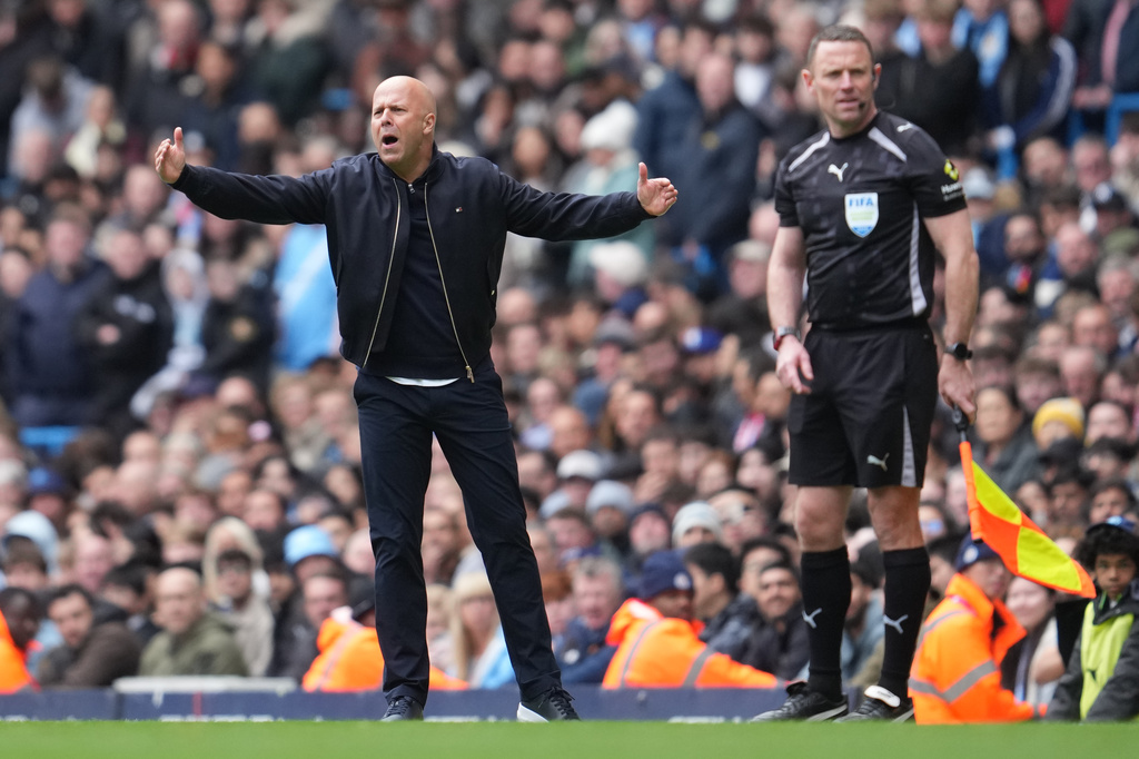 Liverpool's manager Arne Slot reacts during the FA Cup quarter-final soccer match between Manchester City and Liverpool in Manchester, England, Saturday, April 4, 2026. (AP Photo/Jon Super)