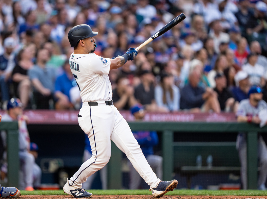 Seattle Mariners' Jhonny Pereda hits a three-run home run during the fifth inning of a baseball game against the New York Mets, Tuesday, June 2, 2026, in Seattle. (AP Photo/Stephen Brashear)