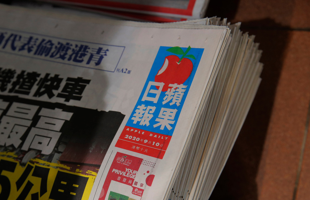 FILE - Copies of Hong Kong's Apple Daily sit at a stand in Hong Kong, Sept. 10, 2020. (AP Photo/Kin Cheung, File)