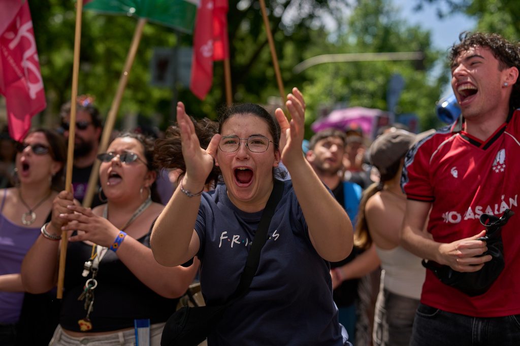 People take part during a protest in Madrid, Spain, Sunday, May 24, 2026, against rising housing costs that are pricing many Spaniards out of the market amid a broader housing crisis in Spain. (AP Photo/Manu Fernandez)