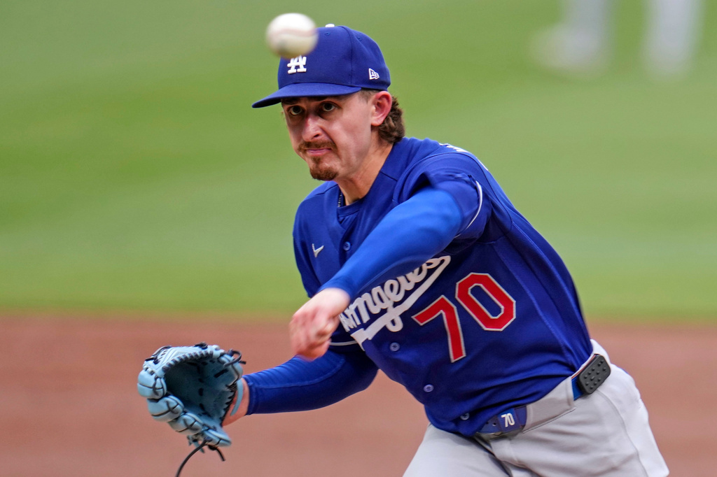 Los Angeles Dodgers pitcher Justin Wrobleski delivers during the first inning of a baseball game against the Pittsburgh Pirates in Pittsburgh, Thursday, June 11, 2026. (AP Photo/Gene J. Puskar)