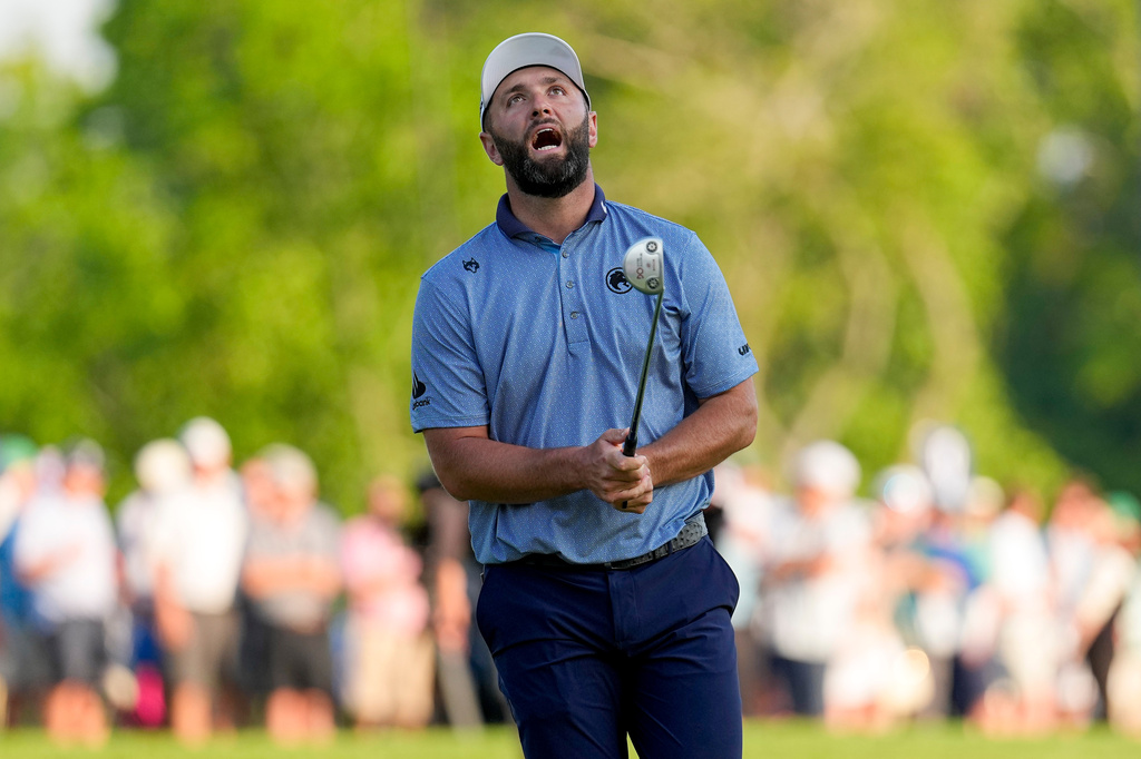 Jon Rahm, of Spain, reacts to missing a putt on the 18th green during the final round of the PGA Championship golf tournament at Aronimink Golf Club, Sunday, May 17, 2026, in Newtown Square, PA. (AP Photo/Carolyn Kaster)