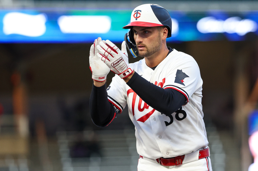 Minnesota Twins' Matt Wallner celebrates his RBI single against the Detroit Tigers during the third inning of baseball game Monday, April 6, 2026, in Minneapolis. (AP Photo/Matt Krohn)
