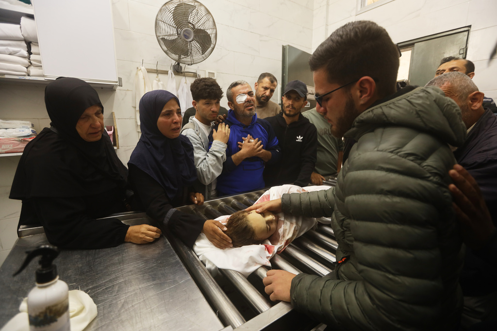 Palestinians mourn over Naya Al-Tanani, killed in an Israeli strike, at Al-Shifa Hospital in Gaza City, Saturday, April 25, 2026. (AP Photo/Yousef Alzanoun)