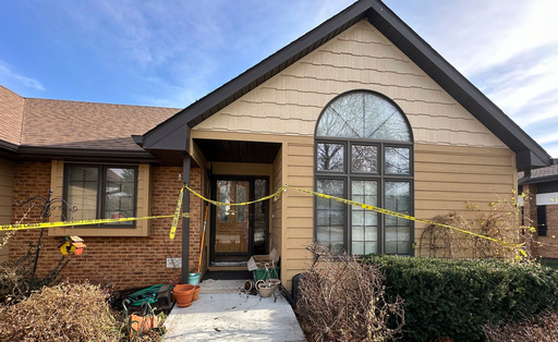 FILE - Police tape blocks the front door of the rectory at St. John the Baptist Catholic Church in Fort Calhoun, Neb. (AP Photo/Josh Funk, File) FILE - Police tape blocks the front door of the rectory at St. John the Baptist Catholic Church in Fort Calhoun, Neb. (AP Photo/Josh Funk, File)