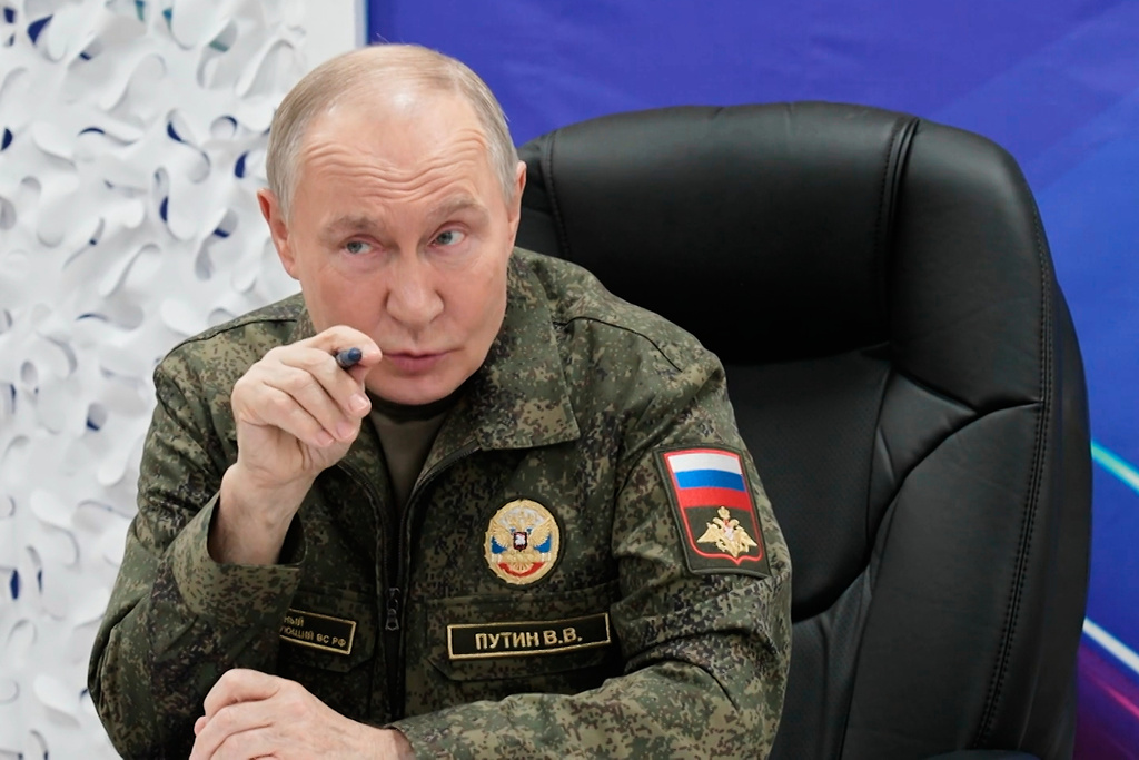 In this image taken from video provided by Russian Presidential Press Service on Thursday, Nov. 20, 2025, Russian President Vladimir Putin speaks as he visits one of the command posts of the West group of Russian Army in an undisclosed location. (Russian Presidential Press Service via AP)