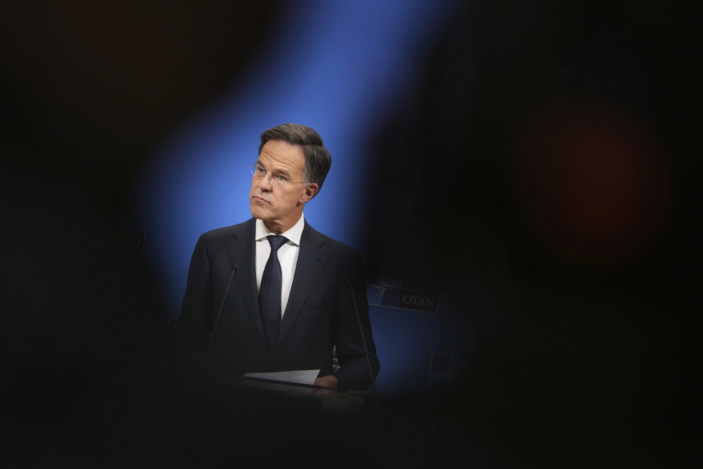 NATO Secretary General Mark Rutte listens to questions from journalists during a media conference at NATO headquarters in Brussels, Tuesday, Sept. 23, 2025. (AP Photo/Virginia Mayo)