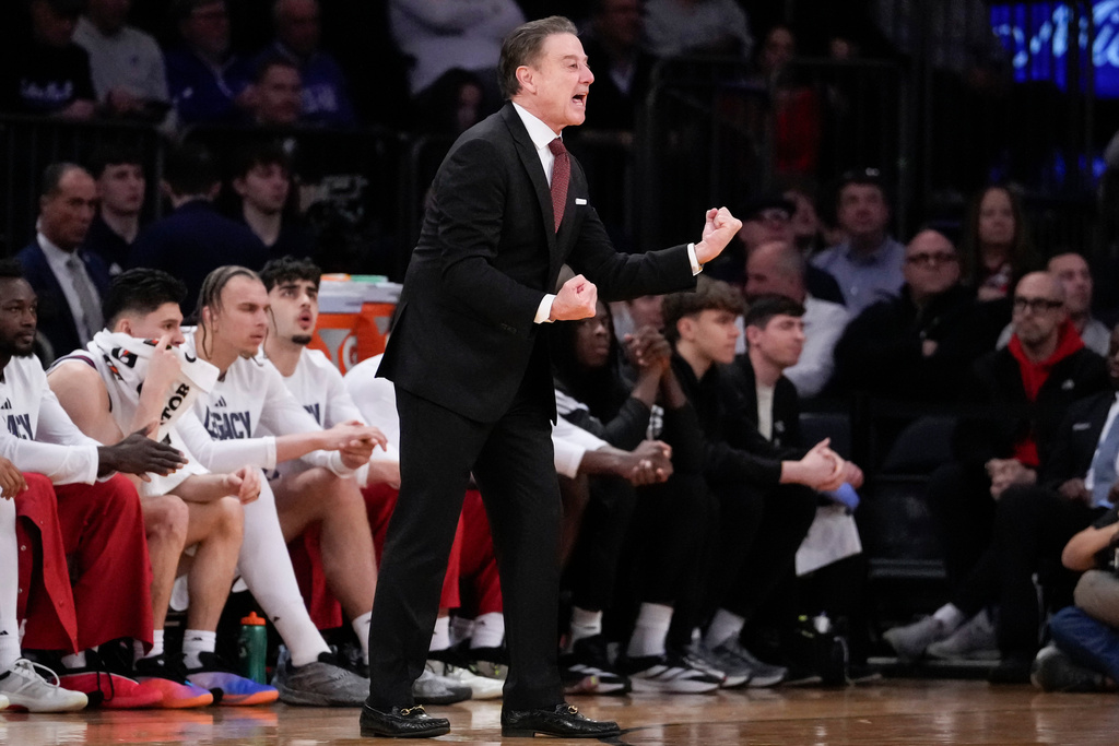 St. John's head coach Rick Pitino, center, gestures during the first half of an NCAA college basketball game against Seton Hall in the semifinals of the Big East tournament, Friday, March 13, 2026, in New York. (AP Photo/Yuki Iwamura)