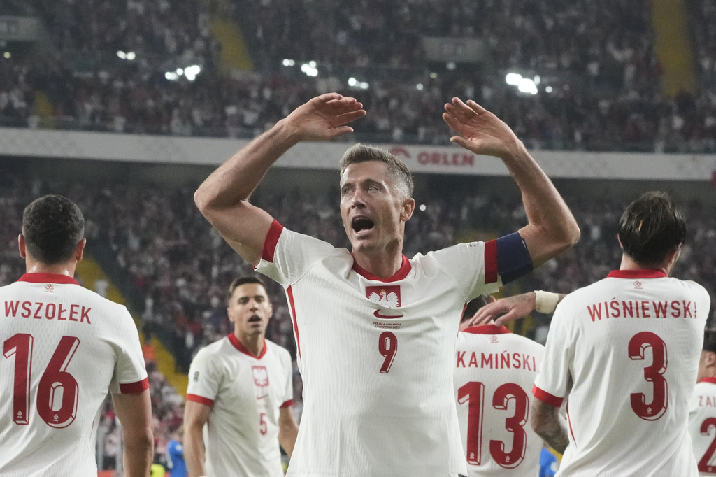 Poland's Robert Lewandowski celebrates during the World Cup Group G qualifying match between Poland and Finland at the at Silesian Stadium in Chorzow, Poland, Sunday, Sept. 7, 2025. (AP Photo/Czarek Sokolowski)