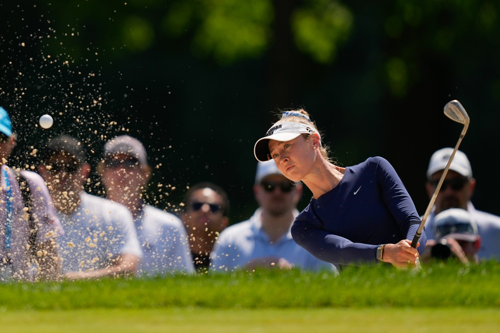 Nelly Korda hits from the bunker on the third green during the third round of the Women's PGA Championship golf tournament at Hazeltine National Golf Club, Saturday, June 27, 2026, in Chaska,Minn. (AP Photo/Matt York)