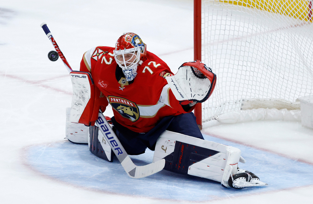 Florida Panthers goaltender Sergei Bobrovsky (72) makes a save against the Washington Capitals during the first period of an NHL hockey game, Monday, Dec. 29, 2025, in Sunrise, Fla. (AP Photo/Rhona Wise)