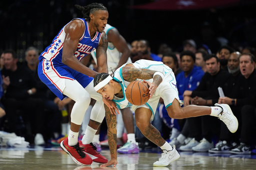 Charlotte Hornets' Tre Mann, right, tries to get past Philadelphia 76ers' Jabari Walker during the first half of an NBA basketball game Saturday, Oct. 25, 2025, in Philadelphia. (AP Photo/Matt Slocum) Charlotte Hornets' Tre Mann, right, tries to get past Philadelphia 76ers' Jabari Walker during the first half of an NBA basketball game Saturday, Oct. 25, 2025, in Philadelphia. (AP Photo/Matt Slocum)