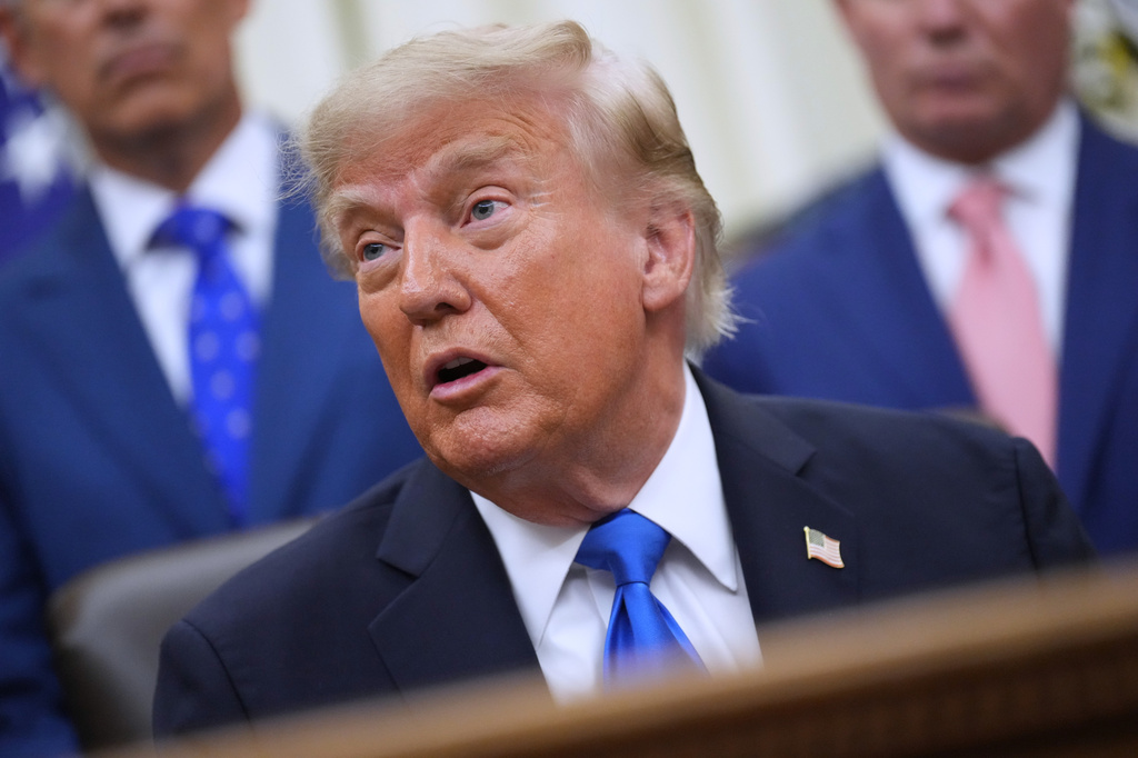 President Donald Trump speaks to reporters in the Oval Office of the White House during a meeting with travel executives, Wednesday, Sept. 2, 2026, in Washington. (AP Photo/Jacquelyn Martin)