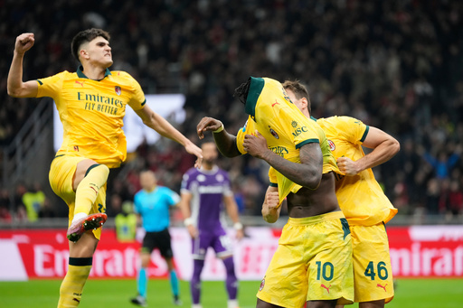 AC Milan's Rafael Leao (10) is congratulated after scoring his side's 2nd goal during a Serie A soccer match between AC Milan and Fiorentina in Milan, Italy, Sunday, Oct. 19, 2025. (AP Photo/Luca Bruno) AC Milan's Rafael Leao (10) is congratulated after scoring his side's 2nd goal during a Serie A soccer match between AC Milan and Fiorentina in Milan, Italy, Sunday, Oct. 19, 2025. (AP Photo/Luca Bruno)