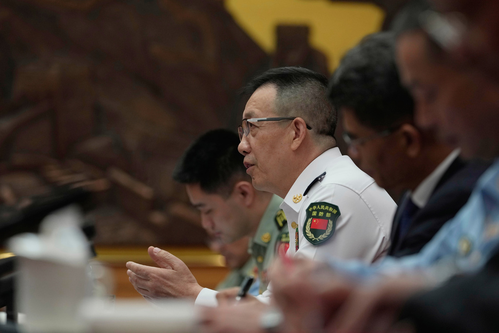 Chinese Defense Minister Dong Jun speaks with Rep. Adam Smith, D-Wash, unseen, who leads a bipartisan group of U.S. lawmakers for a meeting at the Ministry of Defense in Beijing, China, Monday, Sept. 22, 2025. (AP Photo/Mahesh Kumar A., Pool)