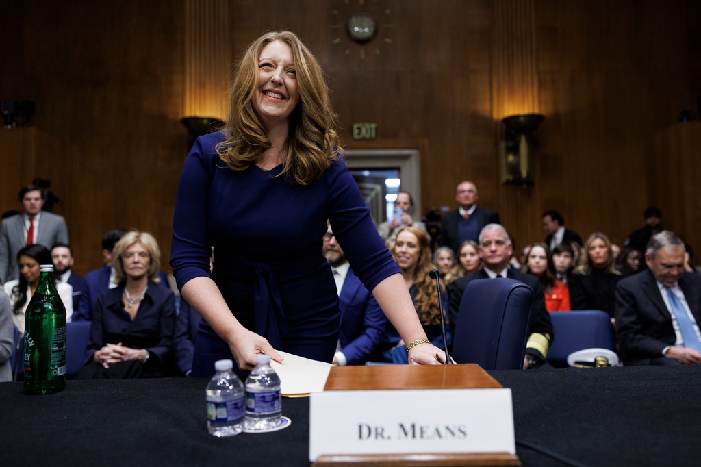 Dr. Casey Means takes her seat at the start of a Senate Health, Education Labor and Pension Committee confirmation hearing for U.S. Surgeon General on Capitol Hill Wednesday, Feb. 25, 2026, in Washington. (AP Photo/Tom Brenner)