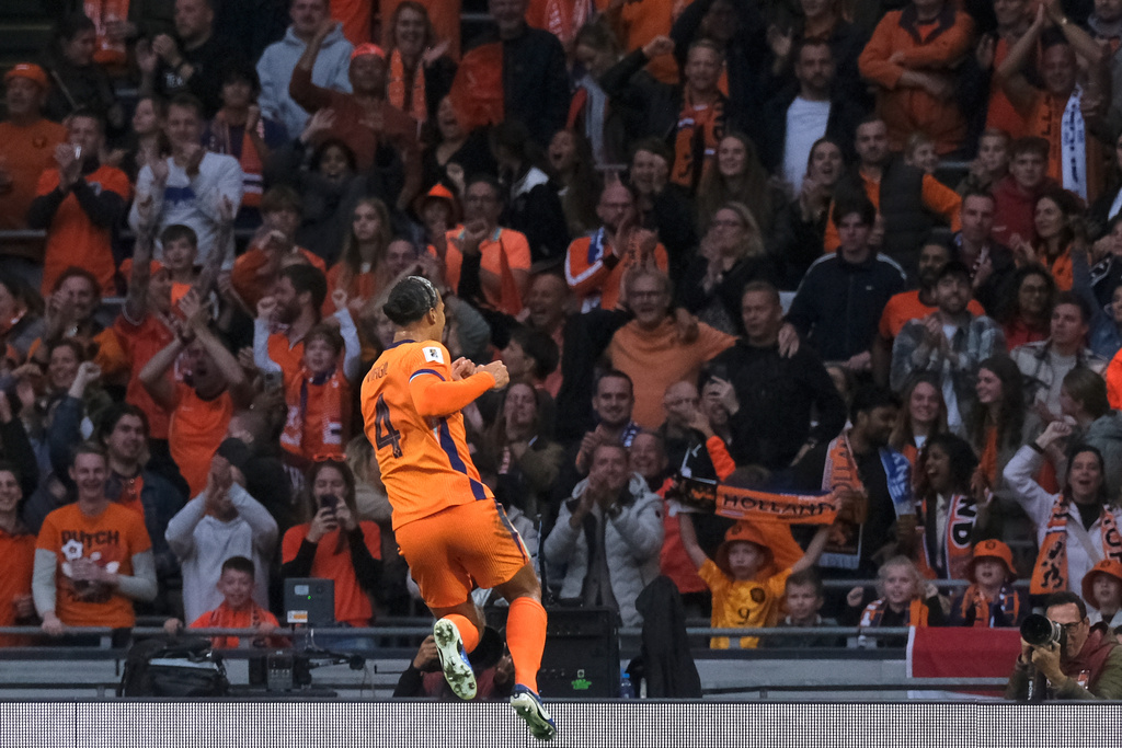 Netherlands' Virgil van Dijk celebrates after scoring his side's second goal during a World Cup 2026 group G qualifying soccer match between the Netherlands and Finland in Amsterdam, Sunday, Oct. 12, 2025. (AP Photo/Patrick Post)