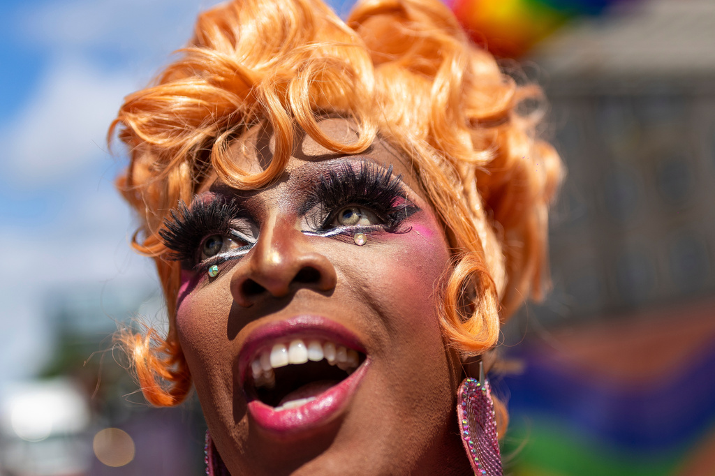 A reveler takes part in a Pride parade in Vilnius, Lithuania, Saturday, June 6, 2026. (AP Photo/Mindaugas Kulbis)