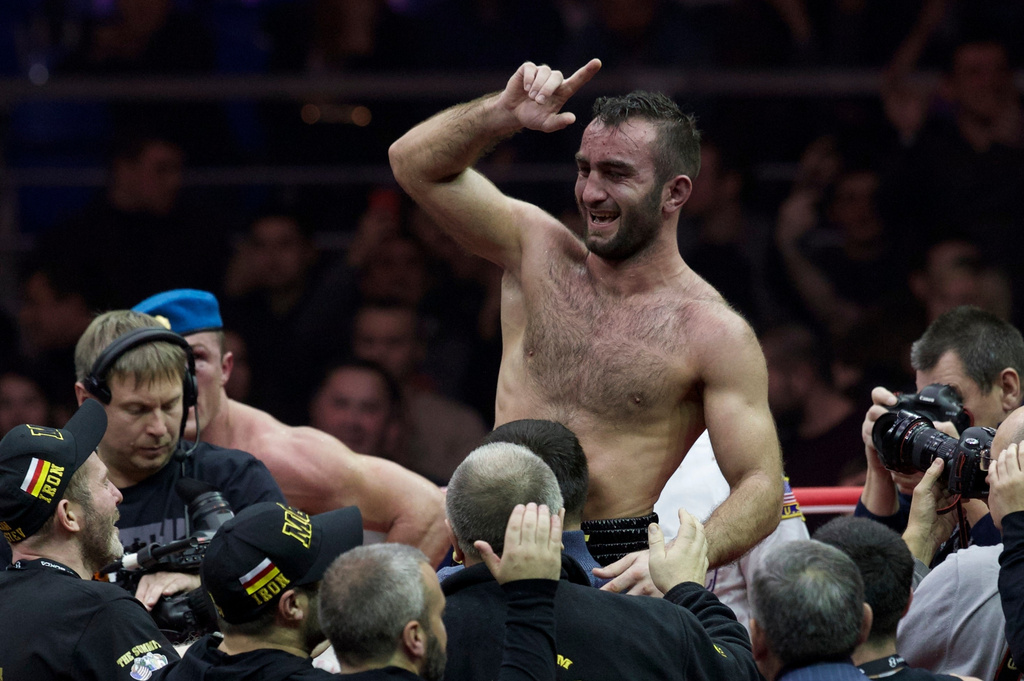 FILE - Russia's Murat Gassiev reacts after winning the IBF cruiserweight title bout against Russia's Denis Lebedev in Moscow, Russia, on Saturday, Dec. 3, 2016. (AP Photo/Ivan Sekretarev, File)