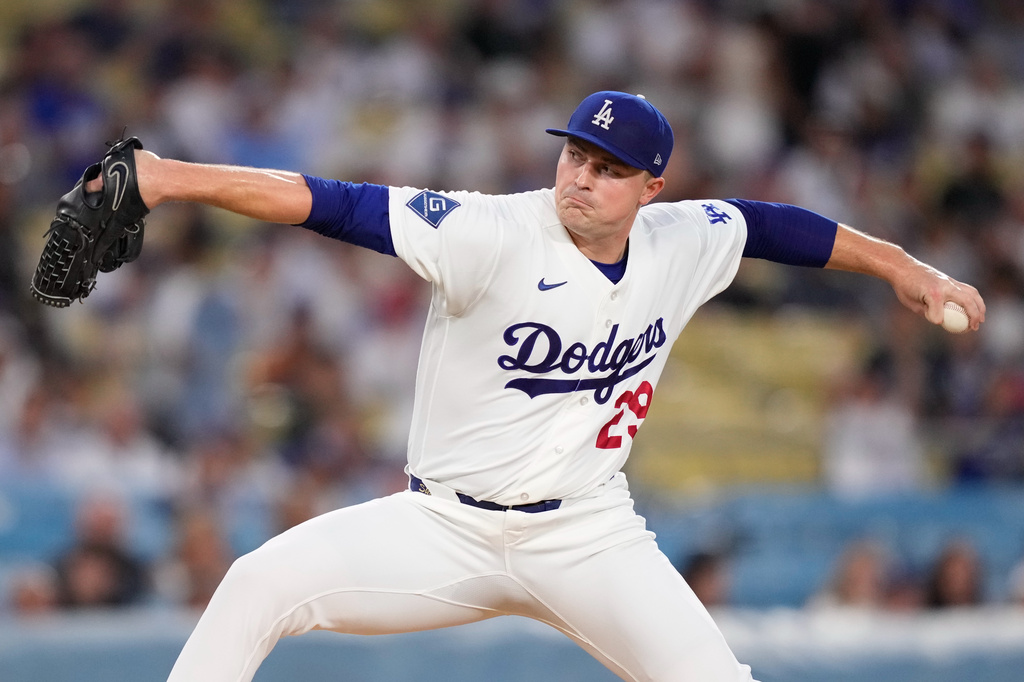 Los Angeles Dodgers pitcher Tarik Skubal throws to the plate during the first inning of a baseball game against the Cincinnati Reds, Tuesday, Sept. 8, 2026, in Los Angeles. (AP Photo/Mark J. Terrill)