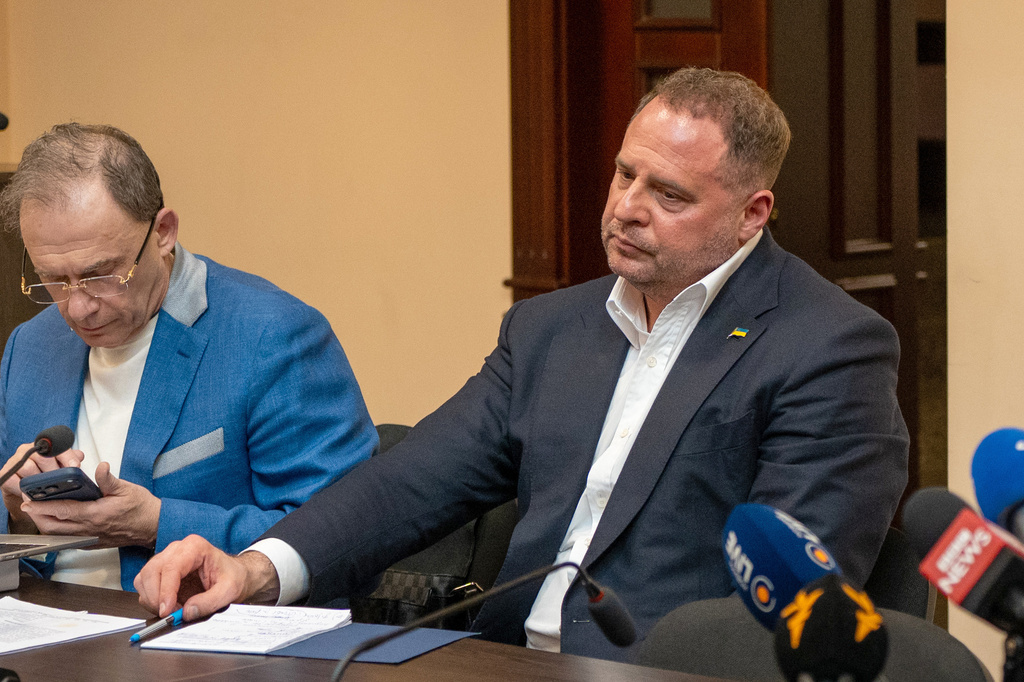 Former Ukrainian president's chief of staff, Andrii Yermak, right, is seen during court hearing in a city court room in Kyiv, Ukraine, Tuesday, May 12, 2026. (AP Photo/Dan Bashakov)