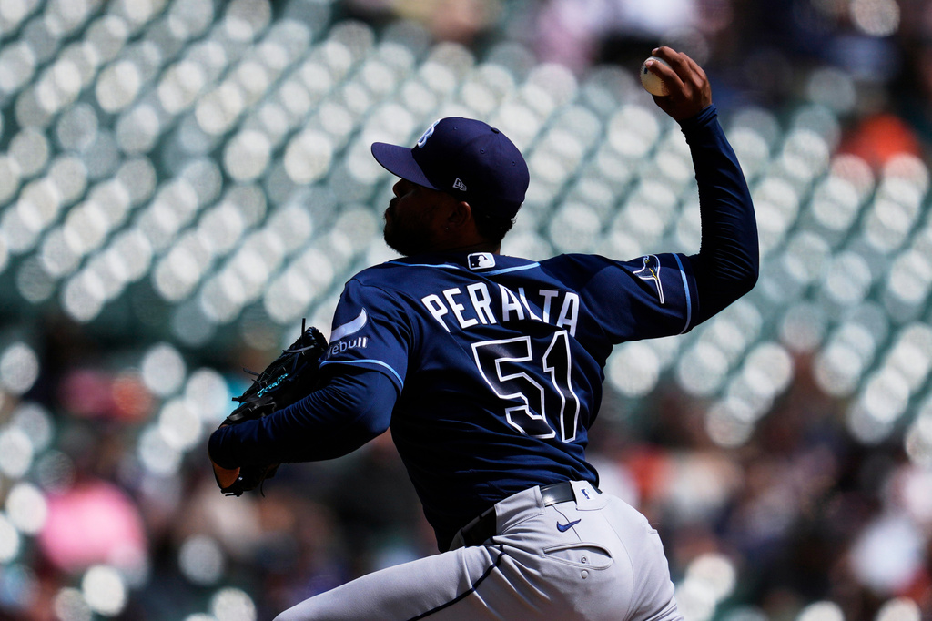 Tampa Bay Rays pitcher Freddy Peralta throws against the Detroit Tigers during the third inning of a baseball game Wednesday, Aug. 26, 2026, in Detroit. (AP Photo/Paul Sancya)