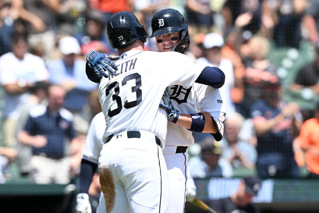 Detroit Tigers' Spencer Torkelson, right, celebrates with teammate Colt Keith at home plates after hitting a two-run home run against the Minnesota Twins in the fourth inning of a baseball game, Thursday, June 11, 2026, in Detroit. (AP Photo/Lon Horwedel)