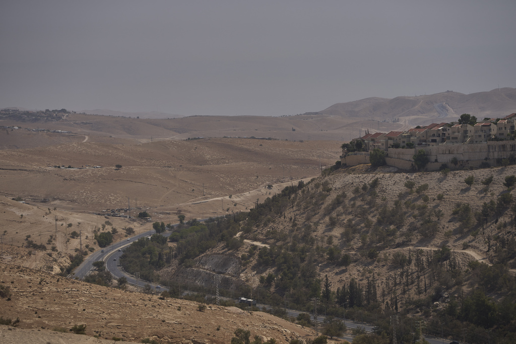 View of an area near Maale Adumim in the Israeli-occupied West Bank, where Israeli Finance Minister Bezalel Smotrich says housing units will be built as part of the E1 settlement project, Thursday, Aug. 14, 2025. (AP Photo/Ohad Zwigenberg)