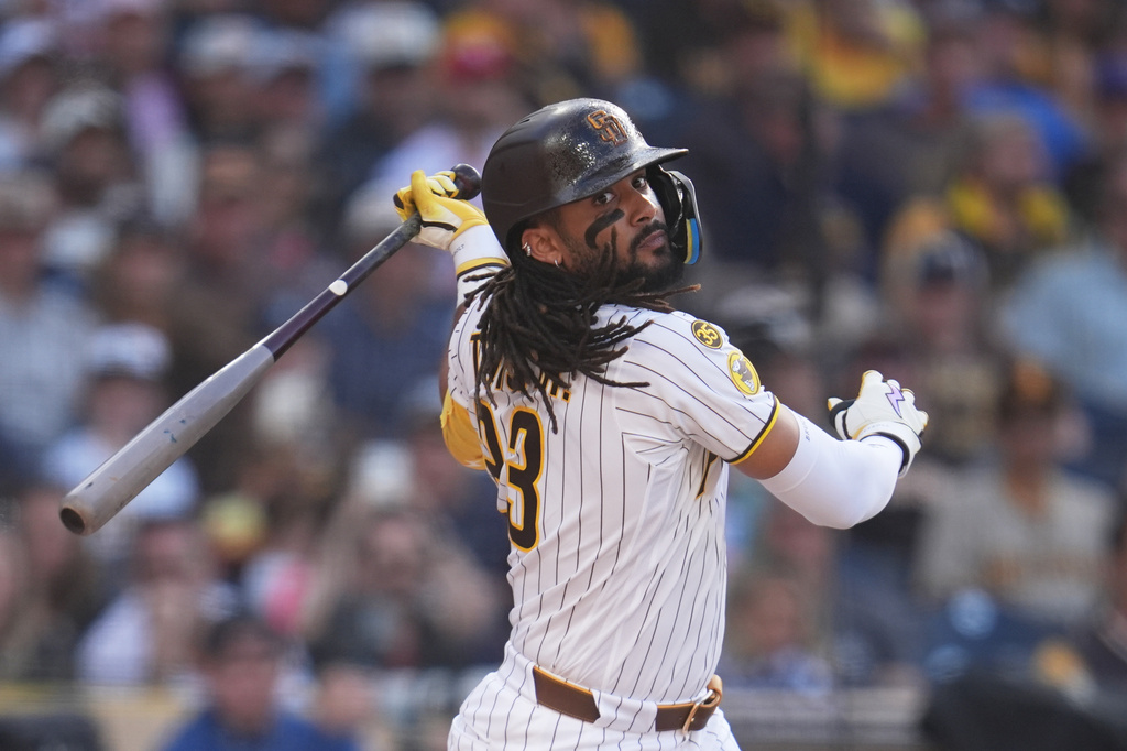 San Diego Padres' Fernando Tatis Jr. watches a foul ball while batting during the fourth inning of a baseball game against the St. Louis Cardinals Saturday, May 9, 2026, in San Diego. (AP Photo/Gregory Bull)