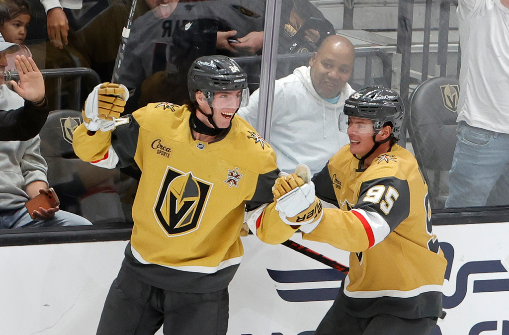 Vegas Golden Knights left wing Trevor Connelly, left, celebrates with left wing Victor Olofsson (95) after scoring against the Chicago Blackhawks during the first period of an NHL hockey game Tuesday, Sept. 29, 2026, in Las Vegas. (Steve Marcus/Las Vegas Sun via AP)