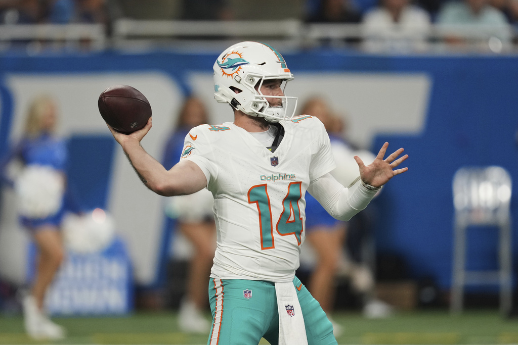 Miami Dolphins quarterback Quinn Ewers (14) passes during the second half of an NFL preseason football game against the Detroit Lions Saturday, Aug. 16, 2025, in Detroit. (AP Photo/Paul Sancya)