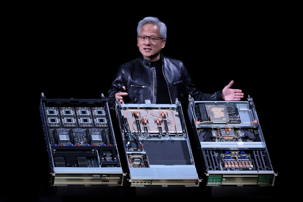 Nvidia CEO Jensen Huang delivers a speech during the Computex 2026 exhibition in Taipei, Taiwan, Monday, June 1, 2026. (AP Photo/Chiang Ying-ying)