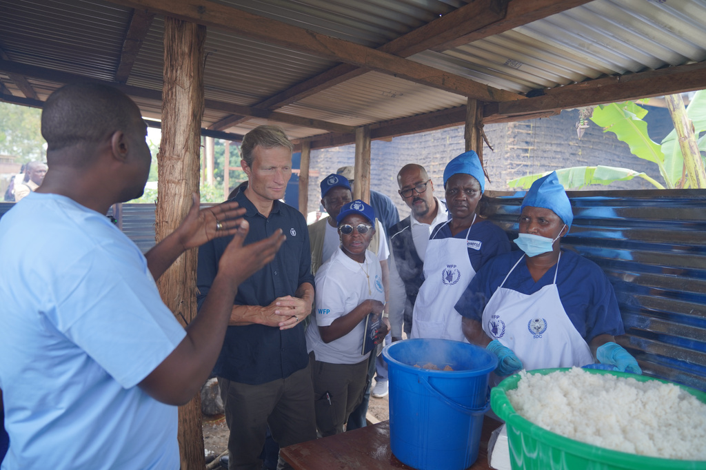Carl Skau, acting executive director of the World Food Programme (WFP), second from right, meets with frontline workers and WFP staff at the Rwampara Ebola treatment center in Ituri, eastern Congo, Wednesday, July 29, 2026. (AP Photo/Dieudonne Dirole)