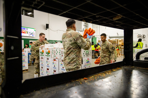 California National Guard sort produce at the Los Angeles Food Bank Wednesday, Oct. 29, 2025, in Los Angeles. (AP Photo/Ethan Swope) California National Guard sort produce at the Los Angeles Food Bank Wednesday, Oct. 29, 2025, in Los Angeles. (AP Photo/Ethan Swope)