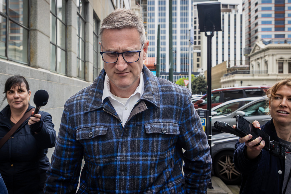 FILE - Former deputy police commissioner, Jevon McSkimming, walks from the High Court in Wellington, New Zealand, on Nov. 6, 2025. (Bruce MacKay/The Post via AP, File)