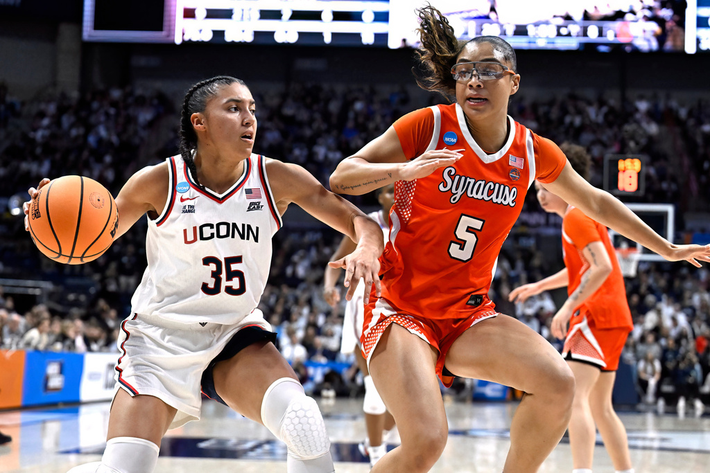 UConn guard Azzi Fudd (35) is guarded by Syracuse guard Laila Phelia (5) during the first half in the second round of the NCAA college basketball tournament, Monday, March 23, 2026, in Storrs, Conn. (AP Photo/Jessica Hill)