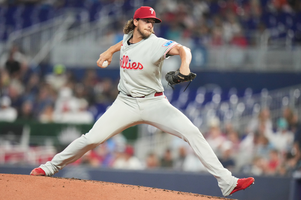 Philadelphia Phillies pitcher Aaron Nola throws during the first inning of a baseball game against the Miami Marlins, Tuesday, July 28, 2026, in Miami. (AP Photo/Lynne Sladky)