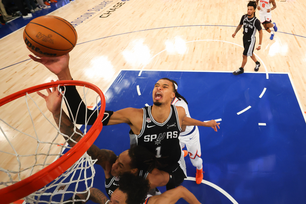 San Antonio Spurs forward Victor Wembanyama (1) shoots against the New York Knicks during the second half of Game 4 of the NBA Finals basketball series, Monday, June 8, 2026, in New York. (Al Bello/Pool Photo via AP)