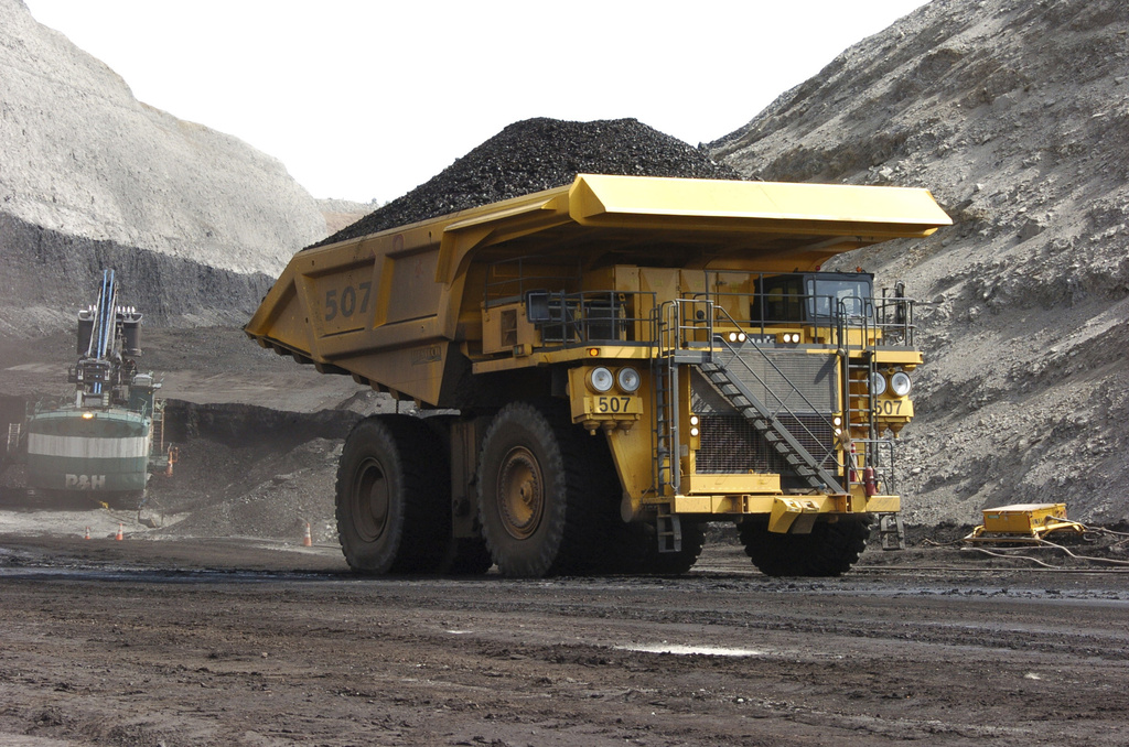 FILE - In this April 4, 2013, file photo, a mining dumper truck hauls coal at Cloud Peak Energy's Spring Creek strip mine near Decker, Mont. AP Photo/Matthew Brown, File)