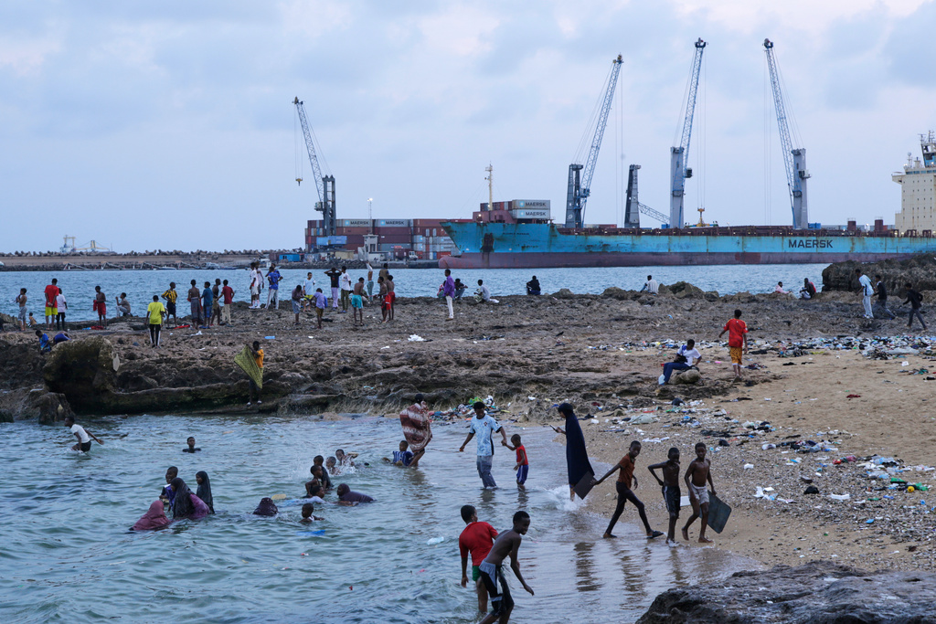 People enjoy the afternoon at the public beach in Mogadishu, Somalia, Thursday, Nov. 6, 2025. (AP Photo/Farah Abdi Warsameh)