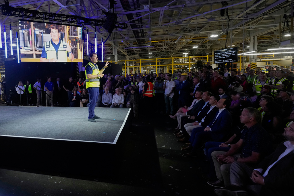 Employees at the Ford Louisville Assembly Plant listen to Ford CEO Jim Farley, Monday, Aug. 11, 2025, in Louisville, Ky. (AP Photo/Darron Cummings)