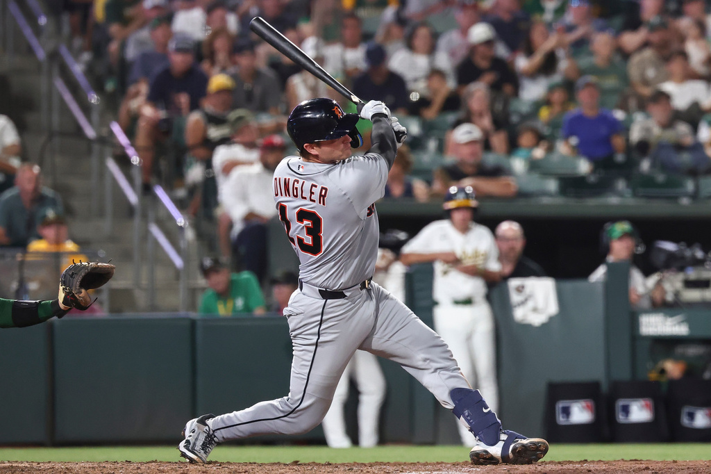 Detroit Tigers' Dillon Dingler hits a grand slam during the eighth inning of a baseball game against the Athletics Friday, July 31, 2026, in West Sacramento, Calif. (AP Photo/Sara Nevis)
