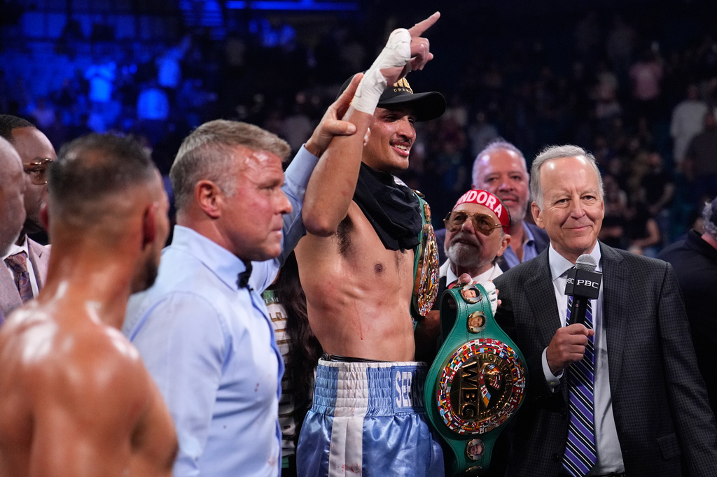 Sebastian Fundora celebrates after defeating Keith Thurman in a super welterweight championship boxing match Saturday, March 28, 2026, in Las Vegas. (AP Photo/John Locher)