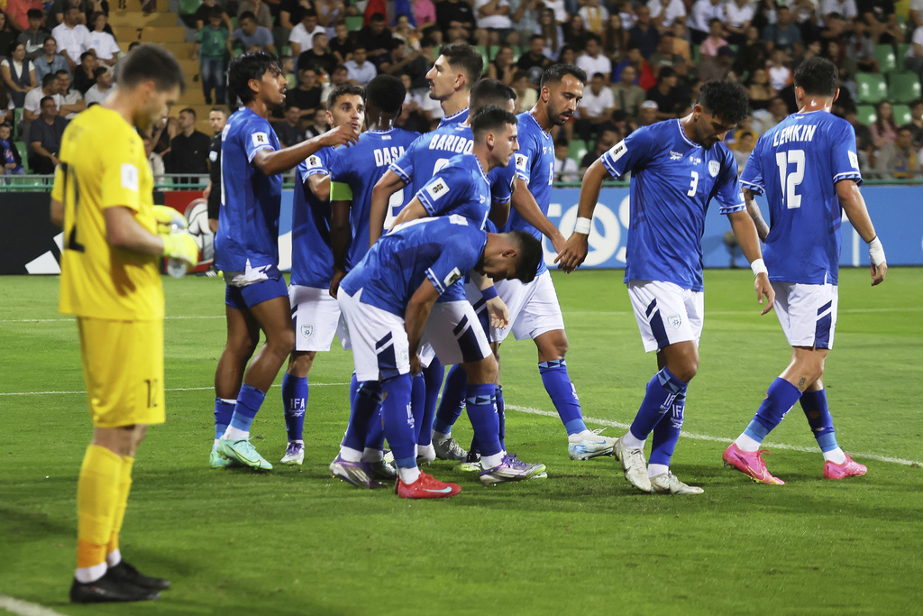 Israel's players celebrate their side's first goal scored by Israel's Dor Peretz during a group 1, World Cup qualifier soccer match between Moldova and Israel at the ZImbru stadium in Chisinau, Moldova, Friday, Sept. 5, 2025. (AP Photo/Aurel Obreja)